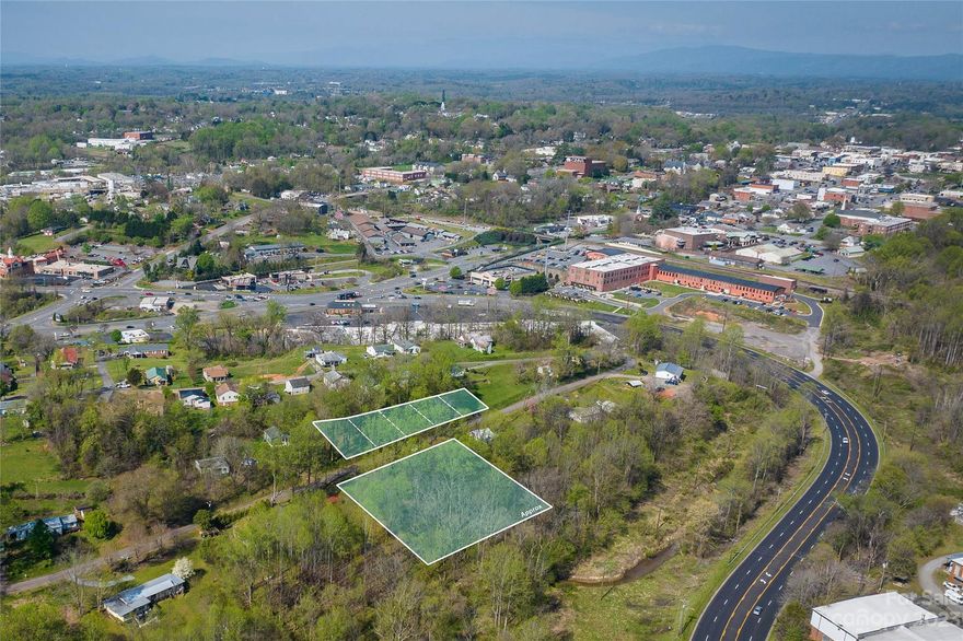 Unique opportunity to purchase property in close proximity to downtown Morganton's amenities including shopping, restaurants, breweries, and CoMMA (performing arts center). Sale includes one .73 acre lot and an additional five lots (totaling .43 acre) across the street. City water and sewer available. Zoning is MID and no overlays. Forest Hill/Liberty/Patton schools.  Lots must be sold together.  Don't miss your opportunity to invest in this growing Morganton market!