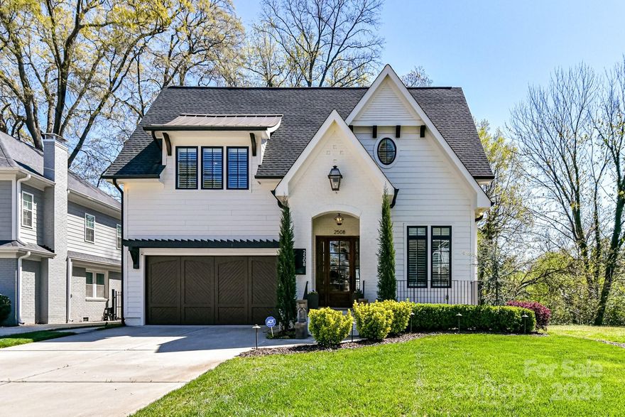 Gorgeous 5 bedroom/3 bath with exceptional floorplan and sophisticated luxury in desirable Plaza Midwood. This THR Design Build home boasts exquisite custom finishes, spacious open floorplan, and hardwoods throughout. The gourmet kitchen boasts top of the line SS appliances, gas range, quartz, large island, and walk in pantry and seamlessly flows into living area with exposed beams, fireplace, and built ins. Elegant primary suite with vaulted ceiling and bath boasting a soaking tub, dual vanities, and large walk-in closet. Retreat onto the screened porch, complete with a movie screen, privacy shade, and Bahama shutter. The fully fenced backyard showcases an outdoor kitchen, a Techo-Bloc patio, a cozy firepit, & hot tub, transforming it into an entertainer's paradise. A 2 car attached garage with storage and a lift. Convenient to Uptown and all that Plaza Midwood has to offer.