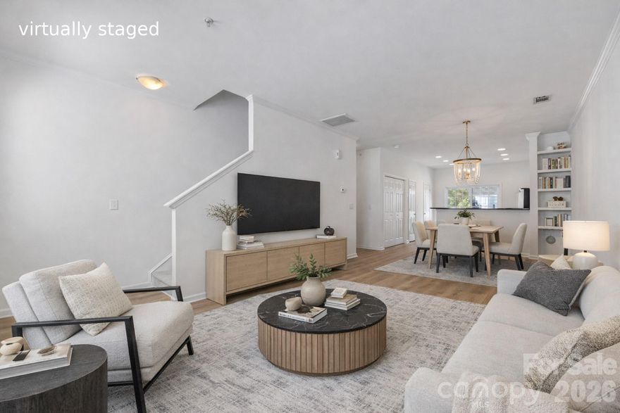 Welcome to 1127 Ilana Ct, a beautifully refreshed home in the heart of Elizabeth with stylish updates and an unbeatable location just minutes from Uptown. With fresh paint, new LVP flooring throughout the living spaces, and new carpet in the bedrooms, this move-in-ready home blends modern finishes with comfortable living in one of Charlotte’s most vibrant neighborhoods.

The first floor features a bedroom and full bath, ideal for guests or a private home office, along with a one-car garage with a storage closet for added convenience. Upstairs on the main living level, you’ll find a bright, open layout with a seamless flow between the living room, dining area, powder room, and kitchen. The kitchen has been updated with all new stainless steel appliances and opens to a small private deck, bringing in natural light and fresh air. The third floor offers a well-designed retreat with the primary suite, convenient laundry area, and an additional bedroom with its own ensuite full bath.

Located in highly desirable Elizabeth, you’re just minutes from shops, restaurants, parks, and Uptown Charlotte. 1127 Ilana Ct offers a rare opportunity to enjoy low-maintenance living with modern updates in a prime location.