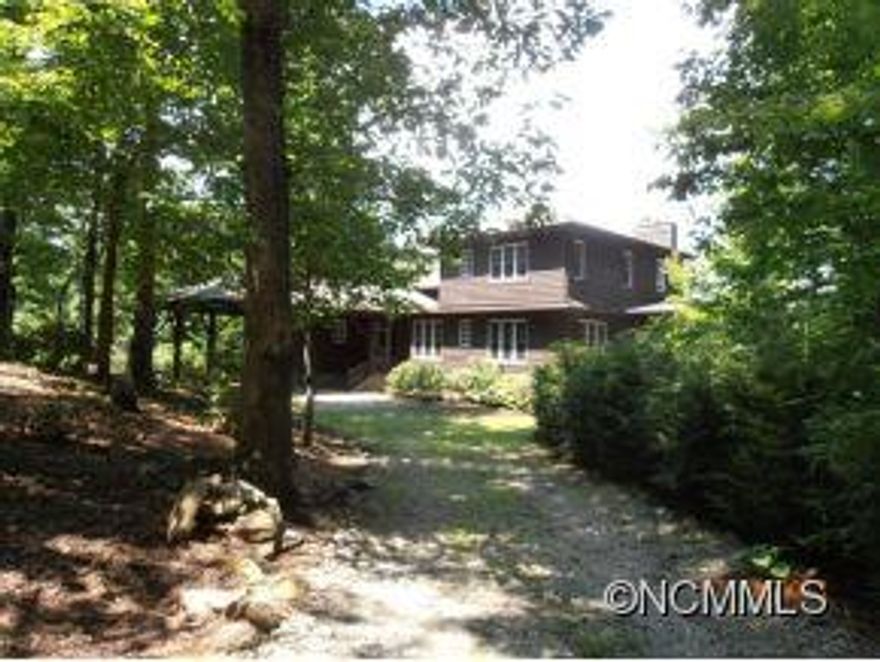 Breath taking views and privacy!Stunning home with post and beam details!Rustic elegance,2 tier decking with stone fireplace,Italian wood burning oven in kitchen!A must see!Buyer should obtain a free prequalification letter from Wells Fargo Home Mortgage,an entity which is a joint venture with Wells Fargo Home Mortgage,or the Neighborhood Assistance Corp. of America (NACA).Free pre-qual can be obtained online at your local HMCï¿½s website.