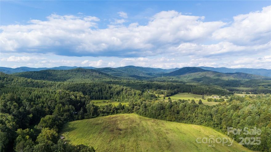 This 10.49-acre parcel is located in the Golden River Farms community of Bostic, NC, and offers a combination of privacy, natural beauty, and long-term potential. The land is primarily wooded, with a mixture of hardwoods and volunteer growth that provide a private setting and an abundance of wildlife. The property sits on top of a hill, giving it an elevated position that provides the opportunity for expansive views. With selective clearing, the site could support panoramic vistas of up to 270 degrees, making it a rare option for anyone seeking a property with both seclusion and long-range visibility.

A homesite was cleared on the property a couple of years ago, leaving a defined spot that could be re-opened for construction. While natural growth has since returned, the clearing provides a strong starting point for a primary residence, second home, or recreational cabin. Access to the property is in place through a well-defined dirt road, giving owners the ability to enter the land without the need for extensive new infrastructure.

Golden River Farms is a private community with basic covenants in place to protect the value and character of the neighborhood. Singlewide manufactured homes are not permitted, and the land cannot be subdivided, ensuring that parcels remain large and private. At the same time, the community allows for flexible recreational use. Campers are permitted on the property, and hunting is allowed, giving buyers the option to enjoy the land immediately even before building a permanent structure. These features make the property appealing both for long-term development and for immediate use as a retreat or weekend getaway.

Properties of this size and setting in Rutherford County are limited, and parcels with elevated topography that can offer broad views are even more uncommon. This 10.49-acre tract provides a balance of usable space, natural beauty, and community standards that protect value without being overly restrictive.
