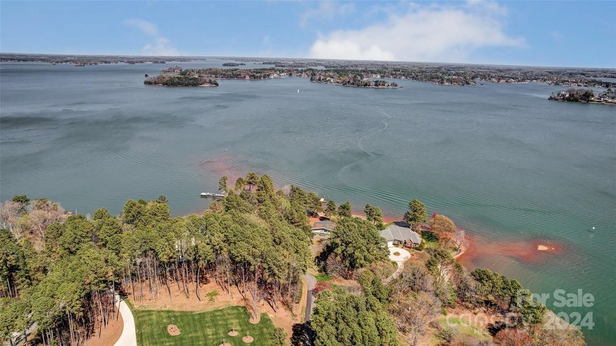 This is an excellent opportunity to own a lakefront lot with expansive views of the main channel on Luckey Point. The lot is almost an acre and offers stunning, panoramic water views. It boasts a sandy beach and a new dock with a lift. This property has 265 feet of shoreline and is in a prime location within Denver. The possibilities with this stunning lot are endless, with sunrise and sunset views. The peaceful community offers a tranquil escape from the hustle and bustle while conveniently located near restaurants and shopping. Deep water at the dock, perfect for all types of boats.