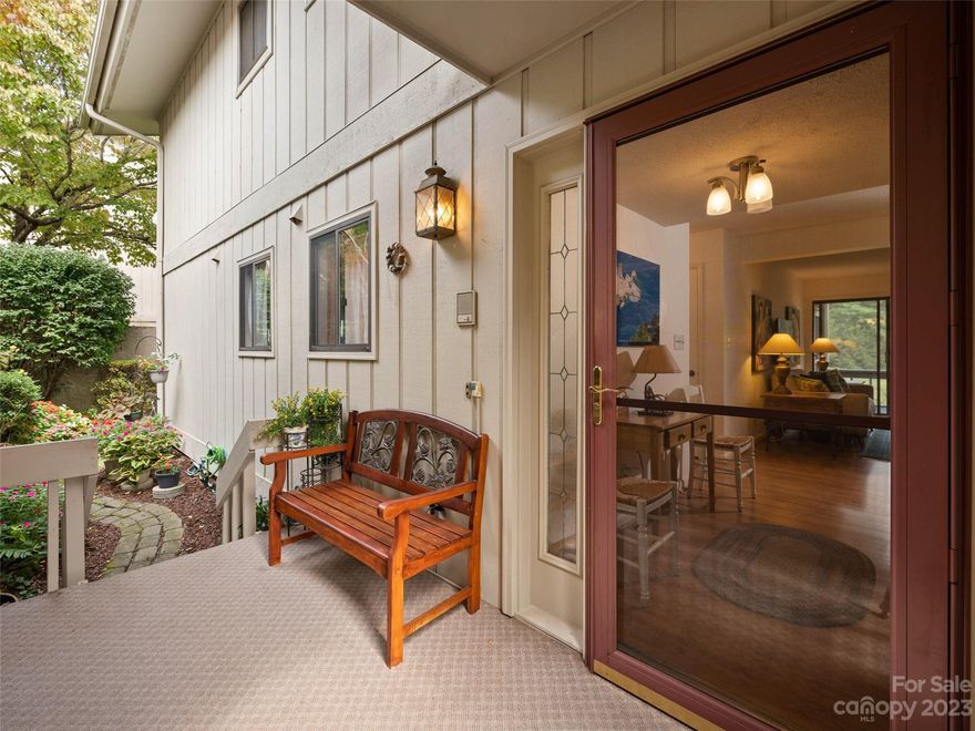 Located in the quiet rear section of the coveted Glen Cannon neighborhood, this end-unit condo is a hidden gem. As you step inside, you'll be greeted by natural light flooding in from the dual sliding doors on either side of a stunning stone fireplace. The open floor plan seamlessly connects the living spaces and the spacious screened porch creates a perfect space for effortless entertaining with friends and family. The primary suite offers a serene oasis with its real brick backdrop and private deck. Lower level has a half bath and plenty of area for home office or workout space as well as additional storage! Come see all the beauty this condo offers today!