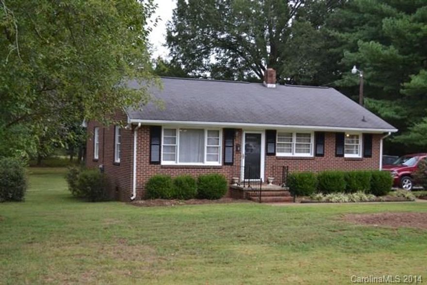 What an adorable brick ranch home!  Pride of ownership shines!  Two large bedrooms, large living area.  Spacious kitchen and dining room.  Lots of hardwood flooring.  Washer and dryer will convey with home.  Newer HVAC system, sits on over half an acre lot!  Two storage buildings.  A must see!