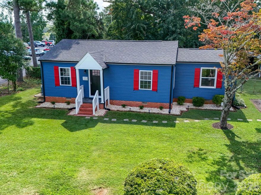 Come live in the heart of downtown Fort Mill and be steps away from an award-winning brewery, restaurants, farmers market and Walter Elisha Park featuring trails, an amphitheater, playground and greenspace - and a stroll to downtown festivals and parades. Significant renovations completed that include a brand-new HVAC system and all new duct work (July 2025), partially encapsulated and sealed crawl space with dehumidification system (Sept. 2024), all plumbing in and under house converted to PEX and PVC (Aug. 2024), all new insulation in attic (July 2025), new exterior doors (Oct. 2024), all new gutters (Sept. 2024) and tons of upgrades inside. 3 BDRs, a full BTH & plenty of space to relax in the living room or fenced in backyard. You will also be <3 miles from Anne Springs Greenway which boasts 2,100 acres of hiking/running/MTB/horseback trails and water sports! Turnkey opportunity that is move-in ready and is also a fantastic short- or long-term rental location. No HOA!