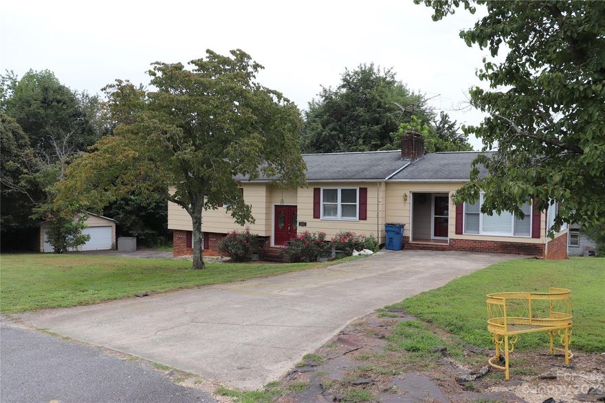 Welcome home to this 3 bedroom, 2 bath home with a full finished basement on .78 acre in the town of Gamewell. Spacious family room with an electric fireplace and wood floors. The kitchen features a bar, plenty of cabinet storage and marble tile floors. Appliances include a range, dishwasher and refrigerator. The dining room is open to the kitchen with a beautiful fireplace. Enjoy the sunroom just off the kitchen. The main level has 2 bedrooms and two bathrooms. The primary bedroom has a tub and separate shower and a large walk-in closet. Downstairs, enjoy the billiard room, and a fireplace with a buck stove insert... and the pool table stays! The lower level also includes a bedroom, laundry room with utility sink and a bonus room that could be used as an office or a sitting room. Washer and dryer convey. Three parcels make up this .78 acre. Sellers are selling the home "as is." Schedule to see this home today!!!