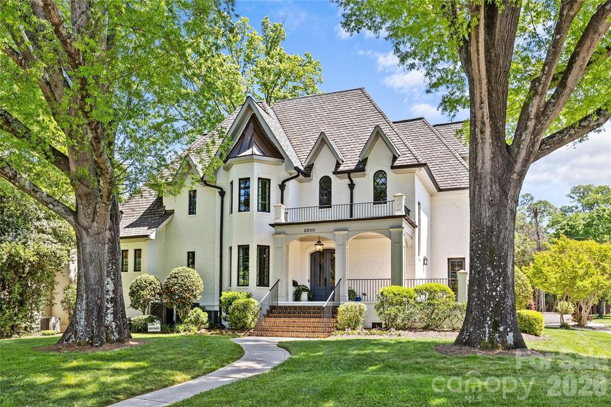 Stunning 6-bedroom, 7.2-bath home offers unparalleled luxury in the heart of Myers Park! Spanning over 6,655 sq. ft. in the main house plus lovely suite above the garage, this home has been extensively renovated top-to-bottom by Bourgeois McGinn Builders. Set on a lush corner lot and exuding elegance with high-end designer finishes, tall ceilings, custom moldings, and beautiful hardwood flooring. Chef’s kitchen boasts top-of-the-line appliances, quartzite countertops, and breakfast nook with fireplace. Formal dining room with a serving station and wet bar. Primary suite features a lavish marble bath and custom walk-in closet. Four beautifully appointed bedrooms on the 2nd level each with a gorgeous en-suite bath and walk-in closet. Bonus room, media room, and 3rd level rec room/exercise area offer no shortage of living spaces. The outdoor oasis includes a turf-fenced yard, covered porch with heaters and automated screens, and a wood-burning fireplace. Too many features to list, this is one you don't want to miss!