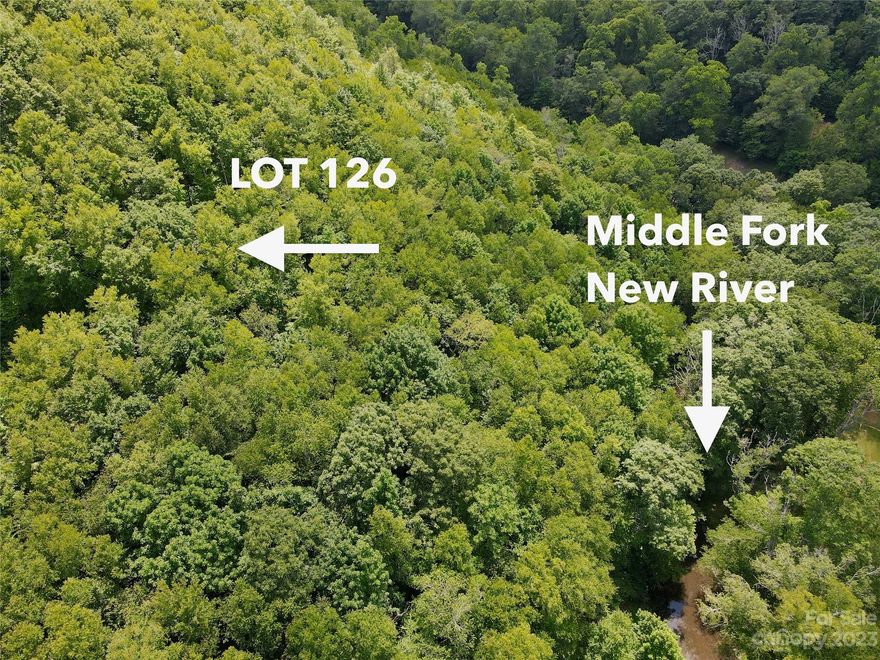 Incredible opportunity for a private lot in Firethorn overlooking the Middle Fork New River with easy access. This lot has sloping to gentle sloping areas for a building site and an active 4 bedroom septic permit in place. Large boulder outcoppings, natural foliage and rhododendron grace the lot. The Middle Fork New River meanders below. Firethorn has common area to the development along the Middle Fork New River for trout fishing. There may be seasonal mountain view potential. Water to the lot via a shared well. Firethorn amenities include over 15 acres of common area green space, a clubhouse, hiking trails backing up to the U.S. National Park with the Blue Ridge Parkway, trout fishing streams, pond, & gate. Firethorn has a 3,000 min sq ft requirement and no short-term rentals are allowed. Potential for a rare double river lot with adjacent lot 127 for sale. Both lots would make for a fantastic 2.4-acre estate site or an opportunity for friends or family to build next to each other.