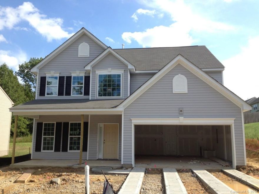 Brand New w/warranties. Home to be finished by November 2014. Lux Kit w/castled cabinets, granite countertops! Wrap-around bar top opens to brkfast & family rm  9ft ceilings.Formal dining has columns and wainscot mold.  BR/BA on main floor. Two BR’s, loft + lg laundry rm+master w/tray ceiling on 2nd flr.