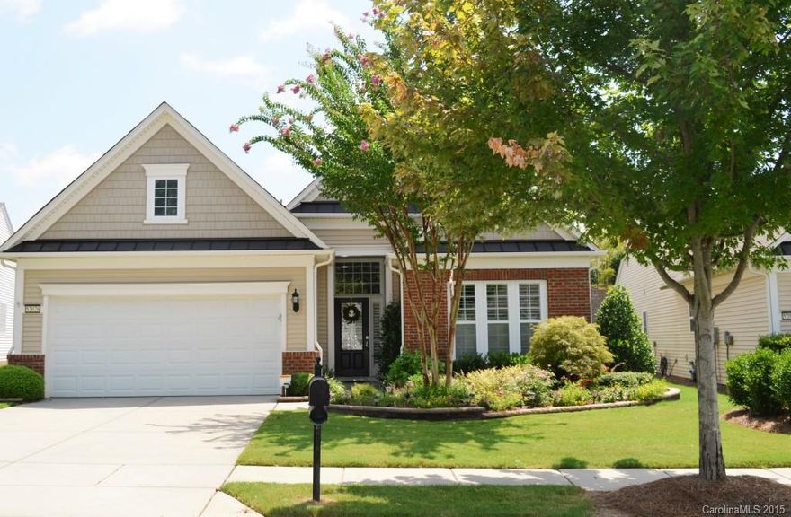 Exquisitely decorated Willow Bend with sunroom, screened porch & oversize paver patio, hardwood and tile throughout, crown molding throughout, foyer opens to Great Rm w/Fireplace, formal dining area w/wainscoting, kitchen w/GE stainless appliances, built-in wine and drink cooler, granite counters, tile backsplash, island, computer niche, eating area, plantation shutters, wooden blinds, irrigation system, security system, new roof 2012, professionally landscaped. 55+ community.