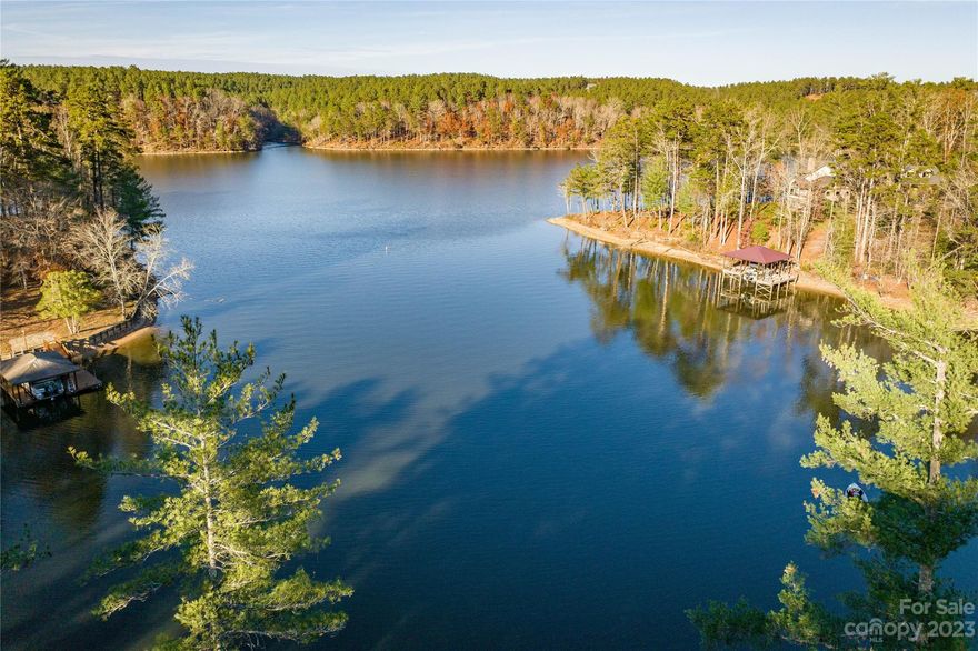 Beautiful Dock Able waterfront lot in Harbor Ridge on Lake Rhodhiss.  This lot has  a panoramic view of the main channel with 142.44 feet of waterfront.   Lake Rhodhiss offers 90 Miles of shoreline and is a fully recreational lake, perfect for boating, sailing, fishing, and swimming. Harbor Ridge is a gated community and has a lot to offer.  Check out Harbor Ridge's HOA Website harborridgenc.hoaspace.com Close to Hickory, Charlotte, Blowing Rock, Boone, and Asheville.