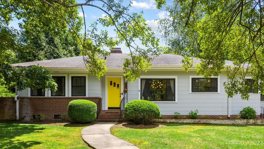 This beautifully renovated home effortlessly blends classic charm with modern upgrades. Listed on the National Historic Registry, it showcases its historical significance. Conveniently located, it's walking distance to the farmer's market, restaurants, schools, shopping, hospital, and Historic Downtown Main Street. Inside, a spacious family room welcomes you with abundant natural light from large windows. Two elegant brick fireplaces create a cozy atmosphere. The tastefully renovated kitchen and bathrooms offer contemporary style while preserving timeless allure. The large fenced and shady backyard provides a private retreat. Situated on a corner lot, there's ample space for gardening and play. Recent updates include new windows, hot water tank, and a basement sealed with a lifetime warranty. Off-street parking and a garage add value. This remarkable home seamlessly combines historic grandeur with modern functionality, making it an exceptional find in a sought-after downtown location.
