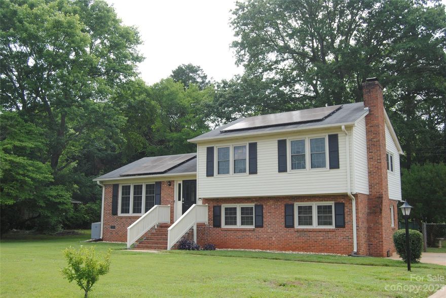 Looking for a convenient and amazing neighborhood?? This home features a large fenced in backyard, outside storage building, parking for 6 cars in driveway!  Short  distance to Cherry Park, Winthrop Coliseum, shopping, and restaurants.  Home is immaculate!  3 bedrooms and 2 full bath up, and 1 bedroom and half bath down.  A family room upstairs and one downstairs (with wood burning fireplace), Crawl space is encapsulated with a dehumidifier lifetime warranty transferable to new owner.  New electrical panel. Home features 2 central air units (one only couple years old).  Kitchen features granite countertops, newer stove with 2 convection ovens. Solar panels (over $25000) for an amazingly low power bill.  House has lots of room!  Hardwired internet in main living room, primary bedroom, adjoining bedroom  and den on lower level.