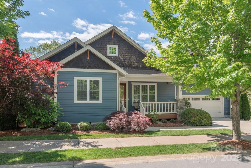 Beautiful home in the highly desirable and conveniently located community of Pinebrook Farms. This move-in-ready, meticulously maintained Craftsman-style home is a nod to timeless design, offering main-level living, spacious open floor plan and generously appointed primary bedroom on the main. The open kitchen boasts granite countertops, premium appliances, large island & tons of cabinet space, with separate pantry & laundry room off of the light-filled dining area. This flexible floor plan offers 3 bedrooms and 2 baths on the main level with a 4th bedroom en suite on the upper level. Enjoy the peaceful outdoors from the spacious screened-in porch connecting to an outdoor deck off the primary bedroom.  A whole-house generator is an added bonus and peace of mind. Experience this warm and welcoming community nestled amidst the mountains including a clubhouse, outdoor pool, fitness facility, tree-lined sidewalks, footbridge to creekside nature trails, and community garden and park.