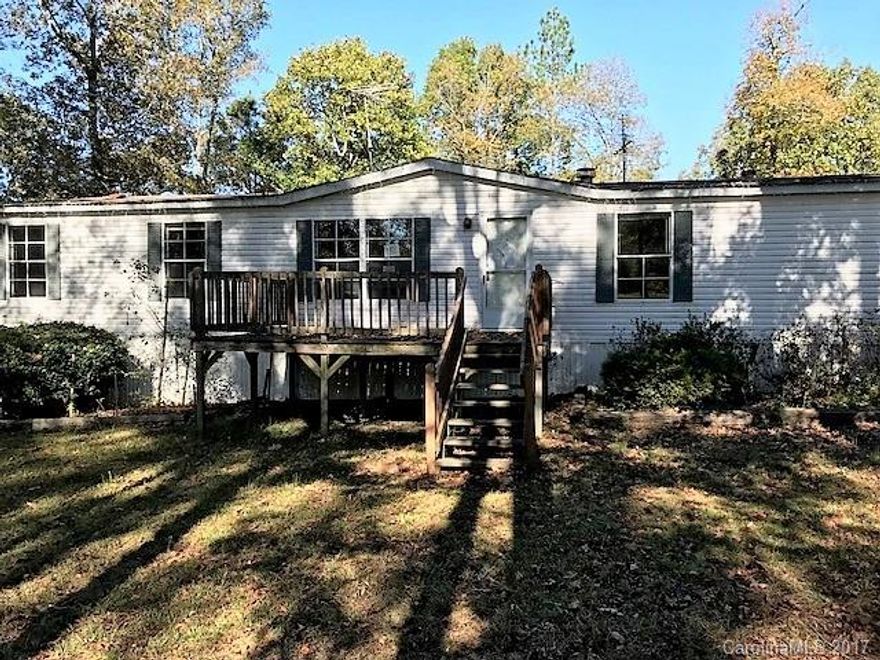 Manufactured DBL Wide sitting on approx .8 acres of land in the country of Lilesville. 3 Bedroom 2 bath home. Large shaded yard. Make this home your very own. Schedule an appointment to see it for yourself!