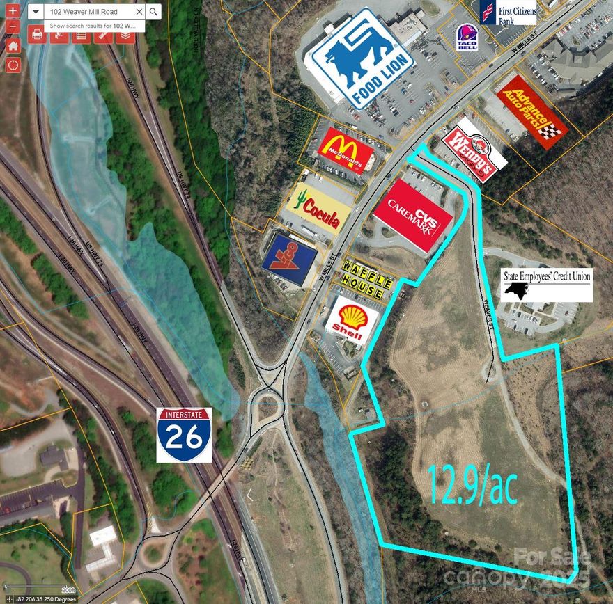 12.9 acre site at the I-26 Columbus NC exit.  Interstate frontage.  Excellent commercial site for a hotel, restaurant, fast food, gas station, c-station, truck stop, etc... on the main commercial corridor in Columbus NC.  Close to Wendy's, McDonald's, Waffle House, Advance Auto Parts, CVS, etc... Very visible.  Zoned HC (Highway Commercial district)
