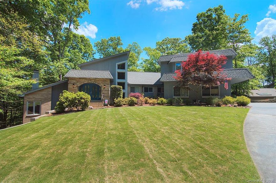 Custom 1 owner River Hills waterfront w boat slip/lift. Upgrades galore! Finished basement w bonus, bedroom & bathroom. New HVAC. Kitchen w center cooking isle. All new ss appliances. Custom cabinetry. Granite counters. Bay window in breakfast room. Master bedroom w fireplace. Master bath w marble vanities, sunken whirlpool tub, custom travertine shower w double shower heads & shelving. Large upper level bedrooms w window seat storage. 2 decks, patio & screened porch. Clover school district.