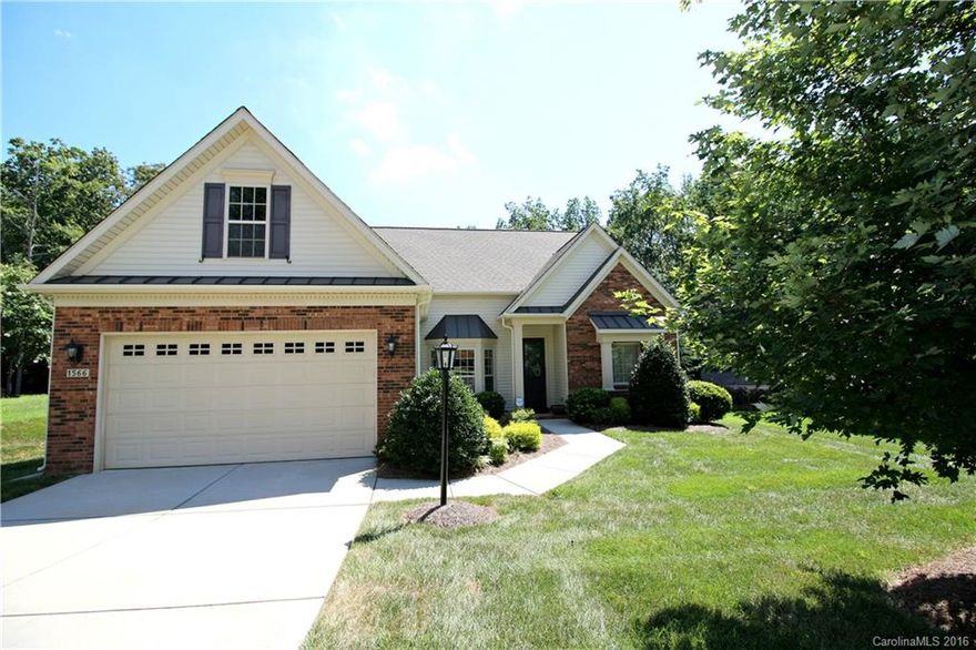 A rare opportunity in sought after Moss Creek.  Located in The Reserve this home is on a great .40 acre lot that backs up to a green space.  Complete privacy for entertaining on this beautiful expanded terrace with hot tub, cozy gas fire pit and gas grill.  Inside you will find one-level living with a split bedroom floor plan, dining room and gourmet kitchen open to the breakfast area and family room.  Upstairs you will find an additional bedroom, bonus room and TONS of storage.