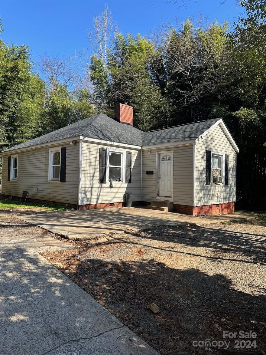 Great opportunity less than 1 mile to South End and 2miles to Uptown. Near Revolution Park and Westover Hills.   As the price reflects, the property is in need of repairs and updating.  Bring your contractor and your imagination.  SOLD AS IS - NO EXCEPTIONS.  BUYER TO HAVE UTILITIES CONNECTED FOR INSPECTIONS.