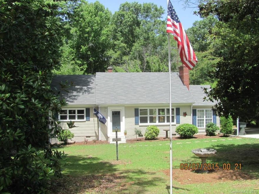 Freshly remodeled 4 bdrm/2 bth doll house. Quiet, established neighborhood, new appliances in kitchen. Hardwood floors on main, sun room, large new deck, free standing carport. Priced to sell.