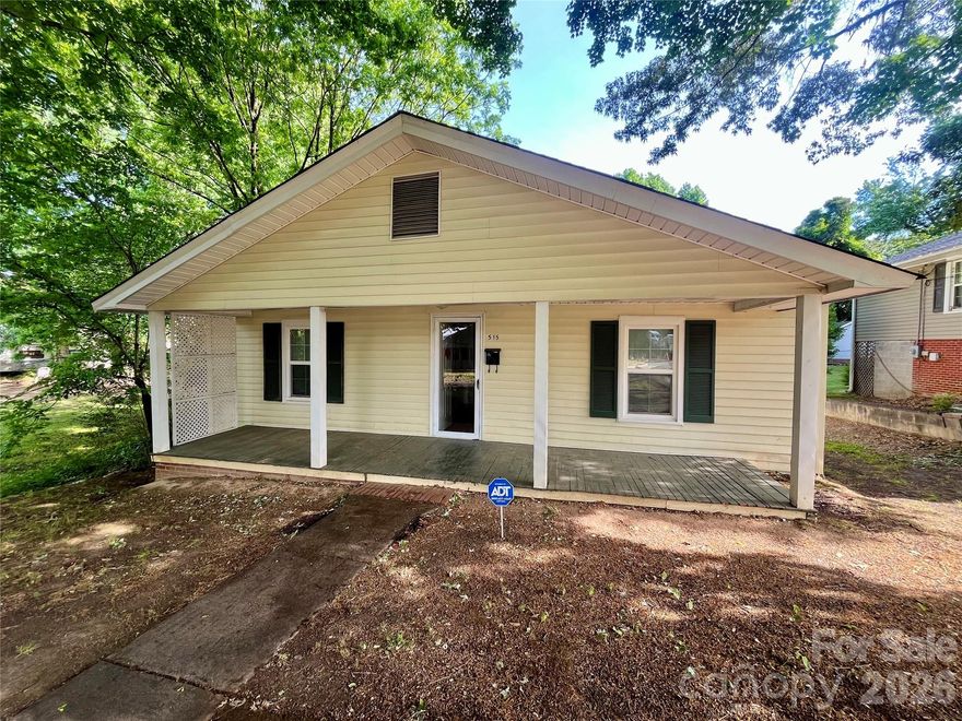 Cozy home with inviting front porch and plenty of updates. 2 large bedrooms split by open kitchen leading to large living room with charming vintage fireplace(coal burning). Large utility room with brand new water heater and space to move and hang drying laundry if needed. Nice wooden deck overlooking large private back yard with storage building and lots of potential. This 2 / 1 is move in ready and waiting for new owner.