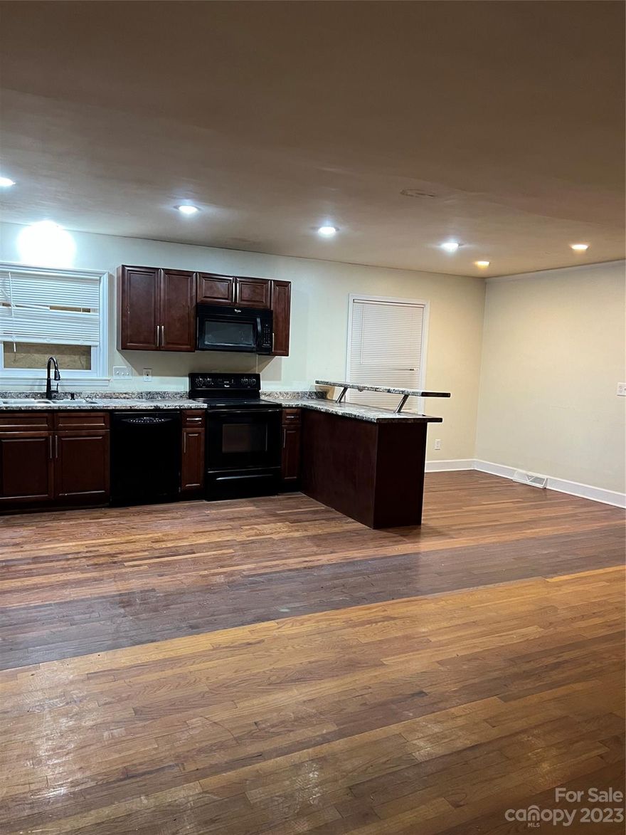 Discover a unique opportunity in the heart of Charlotte, North Carolina. This single-family home, offering 3 bedrooms and 2 bathrooms, is being sold "as is," providing an excellent chance for those seeking a project or investment.
