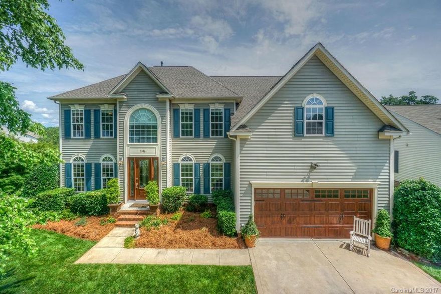 This gorgeous home offers an open floor plan complete with vaulted ceilings, freshly painted throughout,  a sleek, sophisticated kitchen that offers sparkling new granite counter tops, top of the line appliances and an island. Top all that off with smooth textured hardwood floors, a full sized bedroom and bath downstairs and all of this situated on almost a half an acre lot, makes this the perfect home. New tankless water heater, New windows, HVAC and new roof in 2016.