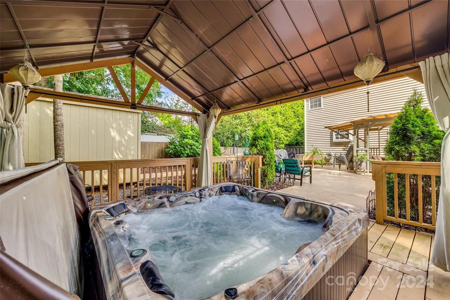 Welcome to this exquisite residence that seamlessly blends modern sustainability with unparalleled luxury. Located in a serene neighborhood, this solar-powered home significantly reduces energy costs. Enjoy outdoor living with an extended patio, extended driveway, and a spacious 16.5x31 ft. wood deck, perfect for entertaining. Relax in the private Jacuzzi or under the shade of two pergolas. The sealed home Nest system ensures energy efficiency, while new flooring, including luxurious porcelain tiles, and a renovated kitchen cater to modern tastes. The private fenced yard offers a secure space for ultimate entertainment. A full alarm system and whole-house intercom provide security and convenience, and the water filtration system guarantees clean water throughout the home. This house is the epitome of elegance, comfort, and modern living. Don’t miss the opportunity to make it yours!