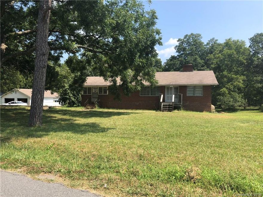 beautiful 13 acres zoned compact residential - property backs up to the hwy 601 - runs 768 feet along hwy 
Land can be accessed from lot 1015 rockland circle sw 

601
Two car external garage in the access area for the 12 acres of land.  The black line through the middle of the house property is a deep ditch. The land is directly behind the house and is described as Hwy 601 - ADDITIONAL PARCEL 5620-20-4226-0000.