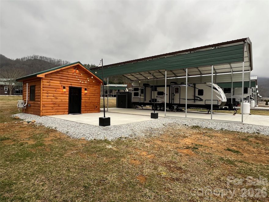Cabin/RV Lot/PAD/RV Carport/2020 Keystone Travel Trailer ALL INCLUDED and ready to be enjoyed this summer! Discover your perfect getaway or permanent residence in the picturesque community of Stecoah, NC! This unique property features a spacious RV, along with a beautifully converted shed that serves as a cozy bedroom and bathroom with laundry facilities. The outdoor setting offers a serene atmosphere, surrounded by the stunning natural beauty of the Smoky Mountains. The shed conversion is thoughtfully designed, providing modern amenities while retaining rustic charm, making it ideal for guests. Enjoy easy access to local hiking trails and outdoor activities, including Tail of the Dragon and Fontana Lake. Whether you're seeking a tranquil retreat, a creative space, or an investment opportunity, this property offers endless possibilities. Don’t miss out on this extraordinary chance to own a piece of Stecoah!