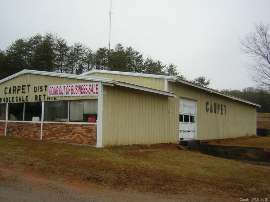 Office/showroom, with warehouse, dock door 10 ft. X 10 ft., drive in door 10 ft. X 10 ft., oil heat in warehouse, visible to I-40 West lanes. located at intersection of I- 40 and US Hwy. 64 ( Cool Springs Exit, Iredell County, NC)
