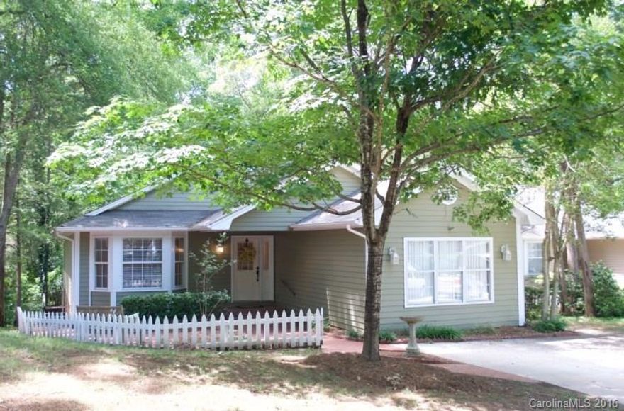 Charming cottage style home with upgrades throughout! 4 bedrooms, 2 1/2 bath home in Fort MIll. Vaulted ceilings, sunroom, large backyard deck, and courtyard in front. Perfect for relaxing or entertaining. New flooring, countertops, lighting, and fixtures. Excellent neighborhood and award winning schools. 3 parking spots in driveway. Large crawl space with plenty of storage area. All yard work and trash services are included.