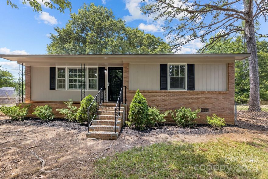 This home sits on a 1+ acre lot in the highly sought-after town of Fort Mill, known for its award-winning school, and its proximity to  Charlotte, NC. This terrific house is for you! It's move-in ready and has NO HOA! Make it your primary home, or an investment rental home. This nice 3-bedroom home has newly refinished hardwood floors and has been freshly painted. The kitchen has new stainless steel appliances and new flooring. A fenced-in level lot, bordered by mature trees. NEW Roof in 2022. It has a shed, and a concrete pad, and a metal frame for a workshop to be built on. Close to shopping, dining, & medical facilities. Commute to Charlotte & Charlotte International Airport approx. 30 minutes.