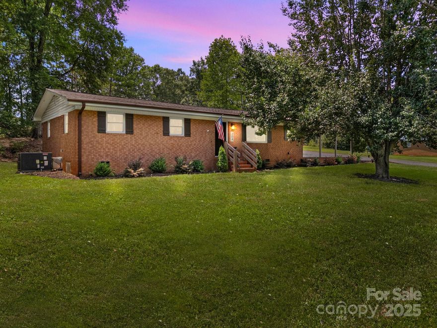 Fully renovated in 2023, this move-in ready Norwood home is packed with style and updates! Enjoy peace of mind with a newer roof, HVAC, LVP flooring throughout, updated fixtures, cabinetry, and stainless-steel appliances. The open layout offers a welcoming feel, but the star of the show is the leathered granite countertops—a rare, textured finish that adds richness and character to the kitchen. Paired with sleek subway tile and modern cabinetry, this kitchen is as functional as it is stunning. Outside, you'll find a charming deck and a spacious backyard ready for entertaining or relaxing. Located just minutes from Lake Tillery and downtown Norwood, this home blends comfort, convenience, and standout design in one incredible package. Don’t miss it!