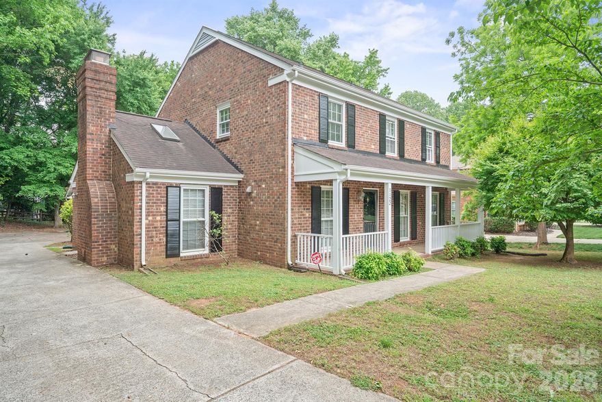 Wonderful 2-story brick home in the highly desireable Sardis Forest subdivision.  Located on a cul-de-sac, this home has a breezeway covered screened porch to the oversize 2 car garage.  With a large traditional living room and an oversized dining room - these spaces are great flex spaces should you need a home office or playroom.  The greatroom is wide open to the kitchen and eat-in breakfast nook.  The greatroom has a beautiful wood burning brick firepace.  Three bedrooms and two full baths are upstairs.  The primary bedroom and closet runs with the width of the house with plenty of room to create a separate sitting area. New carpet upstairs 2026,  Roof Replaced 2019.  Range, microwave and dishwasher - 2026 brand new, never used.  Bring your HGTV design ideas and make this home yours today!  Wonderful Matthews schools, close to downtown Matthews and easy access to I-77 and I-485.  Shopping, groceries, breweries, restaurants, Matthews Farmers Market, festivals and so much more!  Fireplace has not been used in years and is sold as-is. The pool is a separate membership.