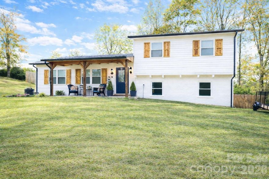 This stunning move-in ready home has it all! Step inside this beautifully renovated home where modern style meets everyday comfort.  Every detail has been thoughtfully updated so you can move right in and start enjoying your new space.  This home is located in a quiet, well-established neighborhood.  Featuring four spacious bedrooms and two full bathrooms, this home offers plenty of room for everyone.  Upgrades include a new roof, new HVAC, new stainless appliances, and a new water heater. The large, fenced back yard features a patio with a pergola for shade, and there is a large outbuilding for extra storage space. A cozy front porch with custom shutters and a beautiful new entry door creates a warm, welcoming feel.  The lower level offers a spacious bedroom, full bathroom, a convenient laundry area, and a large extra space for storage.  The upper level offers 3 bedrooms and a full bathroom, all with spacious closets. The bathrooms have been completely modernized with tile showers, new fixtures, and double sink vanities.  There is brand new flooring throughout the entire home.  Homes like this don't come along often.  Schedule your showing today and see why this one feels like home the moment you arrive!