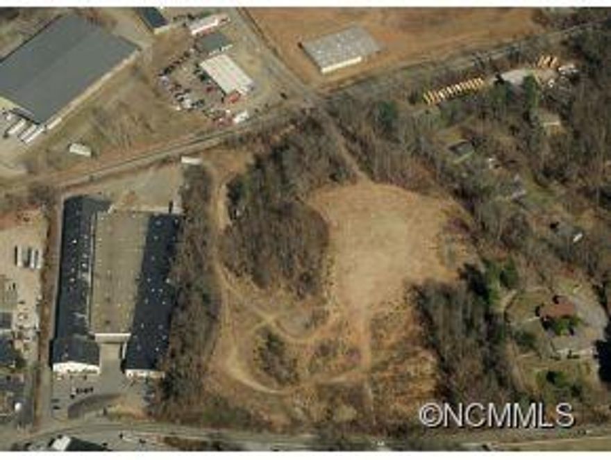 Exceptional development opportunity adjacent to Biltmore Village. Urban Village zoning allows 64 units per acre of mixed use for office, retail and residential. Property known as Whitaker Hill.