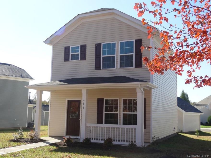 Cute as a button and barely lived in! This home is complete with a rocking chair front porch and ready for move in. Located in desirable neighborhood with community pool and playground and across from common area. Features include gleaming hardwoods throughout first floor, crown moulding, neutral carpet and paints, detached 2 car garage, and nice sized backyard. All appliances and blinds included. Agent related to owner.