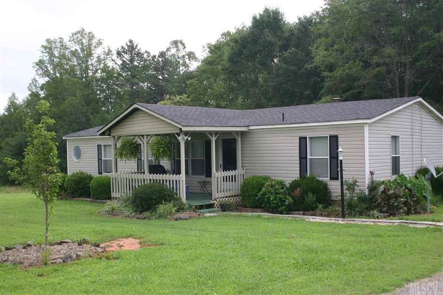 This home can be found in a quiet, country setting. The rooms throughout the home have been recently painted and new wood flooring has been placed in the living and kitchen areas. Updates not reflected in tax value. Only minutes from Hwy 10 and Hwy 127. Additional acre can be purchased.