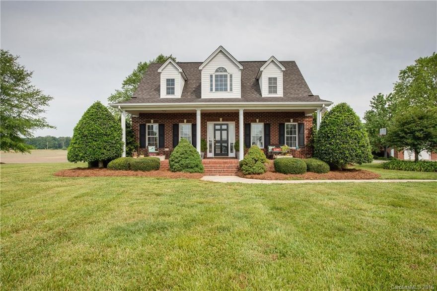 Gorgeous all brick 2 story home in the country!! Granite, new stainless appliances and tile in kitchen with breakfast area and bar. Beautiful hardwoods in den and dining area. New carpet and paint throughout home. Amazing view from concrete patio that includes stone gold fish pond and lush landscaping. Detached garage/workshop with power!! Also comes with a 1 year home warranty!! Be sure to click on film reel to see virtual  tour! Shows like a brand new home!!!