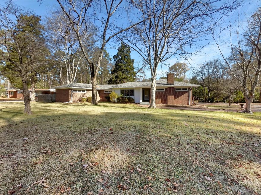 Welcome to this beautiful home! This property is perfect for anyone looking for a cozy and comfortable living space. The natural color palette creates a warm atmosphere throughout the home. The living room features a fireplace for added ambiance. The kitchen features a nice backsplash, and there are other rooms for flexible living space. The primary bathroom has good under sink storage. Outdoors, there is a fenced in backyard with a sitting area. Fresh interior and exterior paint, partial flooring replacement, and a nice backyard make this home a great option. Don't miss out on this great opportunity!