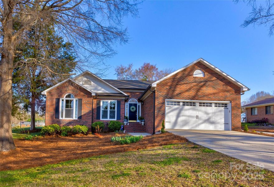 Better Than New!  This full brick ranch features 3 bedrooms and 2 baths with a spacious open-concept plan that seamlessly connects the kitchen, breakfast area, dining area, and great room (which has a wood-burning fireplace).  Recent updates include refinished hardwood floors, fresh paint, new HVAC system, new windows, and a new vapor barrier, plus so much more!  You'll also enjoy the .70 acres with multiple entertaining spaces, including a covered porch, terrace, and fire pit within the fenced backyard.  The two car garage boasts a sleek new epoxy floor.  This charming home is a "must see."  Schedule your tour today!  ATTENTION AGENTS AND BUYERS:  PLEASE NOTE THE CHANGE IN HEATED LIVING AREA AND THE CORRESPONDING PRICE REDUCTION.  WE JUST RECEIVED PROFESSIONAL MEASUREMENTS, AND THEY DIFFER FROM THE TAX CARD.  NO MISREPRESESTATION WAS INTENDED.  BOTH MEASUREMENST AND TAX CARD CAN BE VIEWED IN THE ATTACHMENTS!