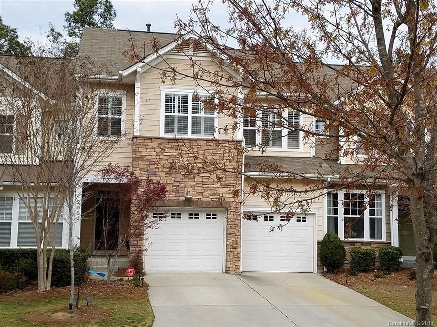 Tega Cay amenity filled Peninsula! RARE 2 car garage & dble drive, 4 BR 3.5 BT w/great balcony views of green space/common area backing to trees. Wood floors on main. Granite counters, work island, large pantry, spacious breakfast area in gourmet kitchen. Large Master suite w/add. balcony, separate garden tub & shower. Upstairs large loft area! Walk-out high ceiling basement w/finished large rec rm, full bath, 4th bedroom (currently an office), large storage rooms, and patio. Easy care living!