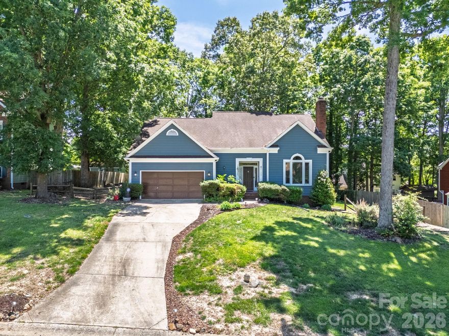 This 4-bedroom, 2.5-bathroom home offers the perfect blend of comfort convenience in a well-established Charlotte neighborhood. Step inside to a bright and inviting living room featuring vaulted ceilings and a 2 story fireplace anchoring the room. The thoughtfully updated kitchen boasts granite countertops, tile backsplash, stainless steel appliances, ample cabinet space, and a spacious breakfast bar. Detailed trim work and beadboard accents throughout the home add character and charm. The spacious primary suite offers a relaxing retreat, complete with a large en-suite bath. Three additional bedrooms provide flexibility for a home office, guest space, or bonus rooms to fit your needs. Enjoy outdoor living on the back deck overlooking a fenced, wooded backyard. Additional highlights include a 2-car garage and an extended driveway for extra parking. Conveniently located just minutes from U.S. National Whitewater Center and Charlotte Airport, with easy access to I-485. Schedule your showing today!
