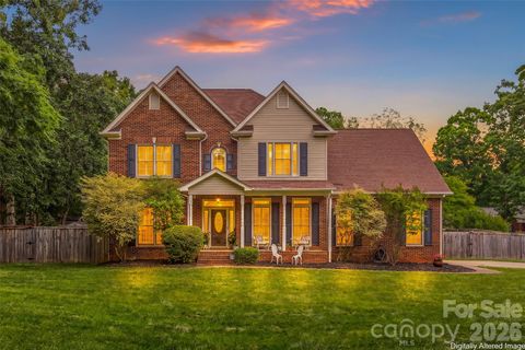 Photo of 1305 Mill Race Lane, Matthews, NC 28104 (MLS # 4379571)