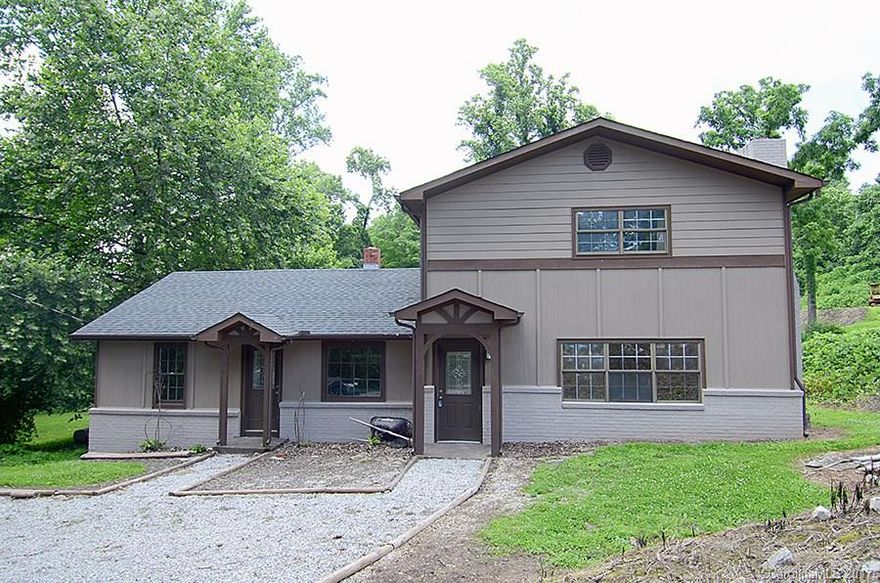 Beautiful home that just needs to be finished. Freshly painted inside and out, large eat-in kitchen, mudroom, large living room with wood burning fireplace, dining room, 2 bonus rooms downstairs, new roof.... Lots of potential!! Convenient location and priced to sell. Home is being sold in as is condition.