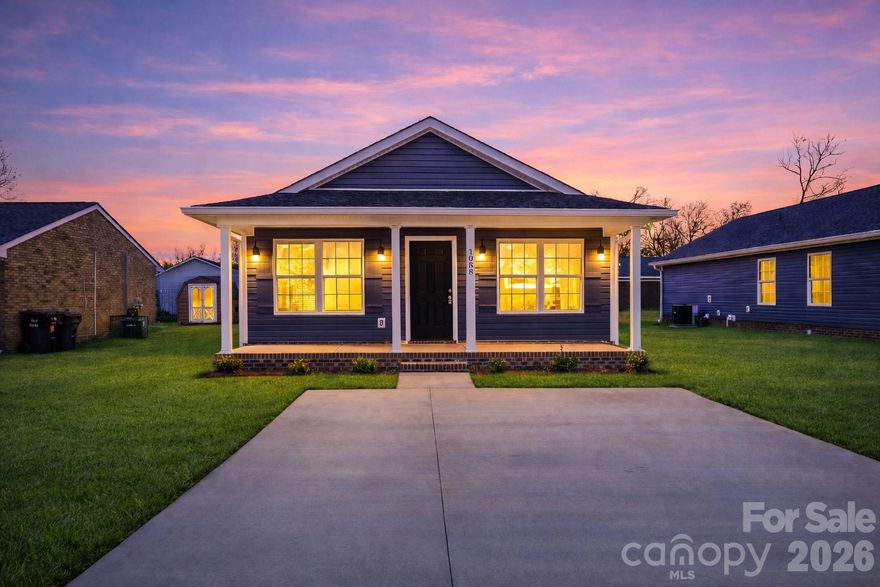 New construction in the heart of downtown Rock Hill! This thoughtfully designed 3BR/2BA home offers an open-concept layout with modern, neutral finishes throughout. The kitchen features white shaker cabinetry, granite countertops, stainless steel appliances, and a center island, opening to the living and dining areas for easy everyday living.

The primary suite includes a private bath and generous closet space. LVP flooring, recessed lighting, and a functional floor plan make this home comfortable, efficient, and move-in ready. Designed with low-maintenance materials and energy-conscious features, this home offers a great opportunity for buyers seeking new construction at an accessible price point.

Conveniently located near downtown, shopping, dining, and major roadways. Schedule your showing today! *Agent has ownership interest