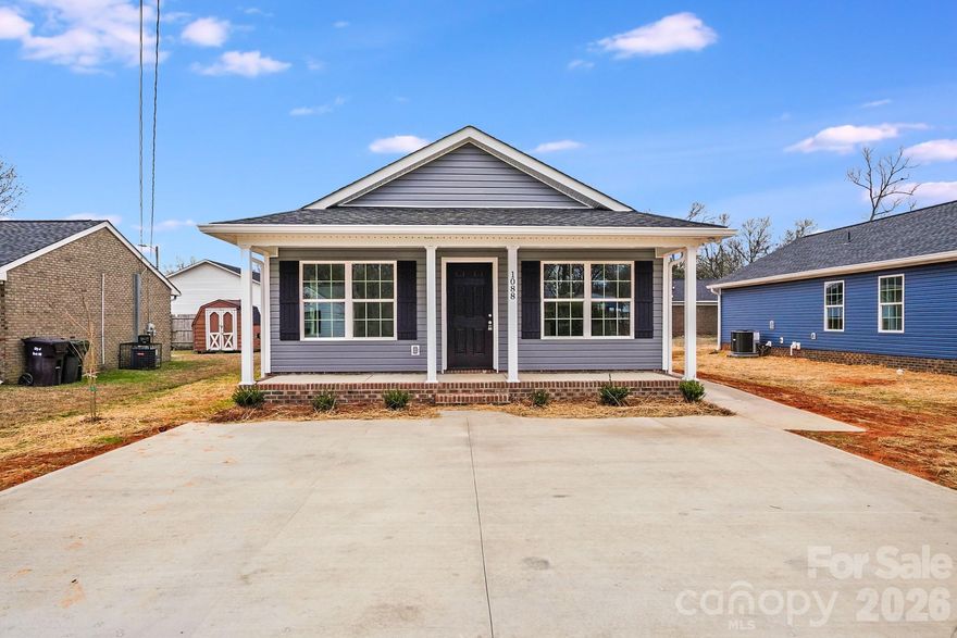 New construction in the heart of downtown Rock Hill! This thoughtfully designed 3BR/2BA home offers an open-concept layout with modern, neutral finishes throughout. The kitchen features white shaker cabinetry, granite countertops, stainless steel appliances, and a center island, opening to the living and dining areas for easy everyday living.

The primary suite includes a private bath and generous closet space. LVP flooring, recessed lighting, and a functional floor plan make this home comfortable, efficient, and move-in ready. Designed with low-maintenance materials and energy-conscious features, this home offers a great opportunity for buyers seeking new construction at an accessible price point.

Conveniently located near downtown, shopping, dining, and major roadways. Schedule your showing today! *Agent has ownership interest
