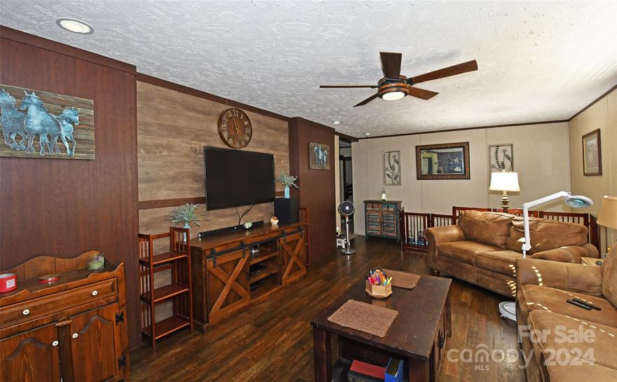 This delightful home sits on 2.2+/- acres, offering ample space both indoors and out. On clear nights, enjoy a fire and gaze at the stars, including the Big Dipper. Conveniently located near shopping, quaint small-town stores, and groceries, it's just 20 minutes from Charlotte. Experience the best of off-the-beaten-path country living. In the late afternoon, deer and wild turkeys often visit, embodying the tranquility of nature. This home is an ideal retreat. It features three full bedrooms and a bonus room that can serve as an office, a gym, or an extra bedroom. The expansive outdoor area is perfect for gardening and growing your own vegetables. It's an ideal setting for large family gatherings or simply enjoying peace and quiet with your loved ones. Major highways, I-77 and I-40 are just minutes away. The home is move-in ready, and some furnishings may be included upon request.