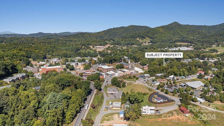 Discover the perfect opportunity to build your dream home or investment property on this charming 0.75-acre lot in the heart of Mars Hill, NC, a vibrant university town with a population of just 2,222. Nestled in the Blue Ridge Mountains, this property offers convenient access to the best of Mars Hill’s amenities. Enjoy live performances at the renowned Southern Appalachian Repertory Theatre (SART), stroll along the scenic greenway walking trail, or take on the iconic 3-mile loop around town. Outdoor enthusiasts will love the nearby Bailey Mountain Preserve, a stunning 300-acre conservation area with hiking trails leading to panoramic summit views. With easy access to rafting, fishing, hiking, biking, and the newly opened Hatley Ski Resort, this location is ideal for year-round recreation. Zoned R2 for low-density residential use, this lot provides flexibility for your vision. Just 20 minutes from Asheville, experience the perfect blend of small-town charm and big-city convenience!